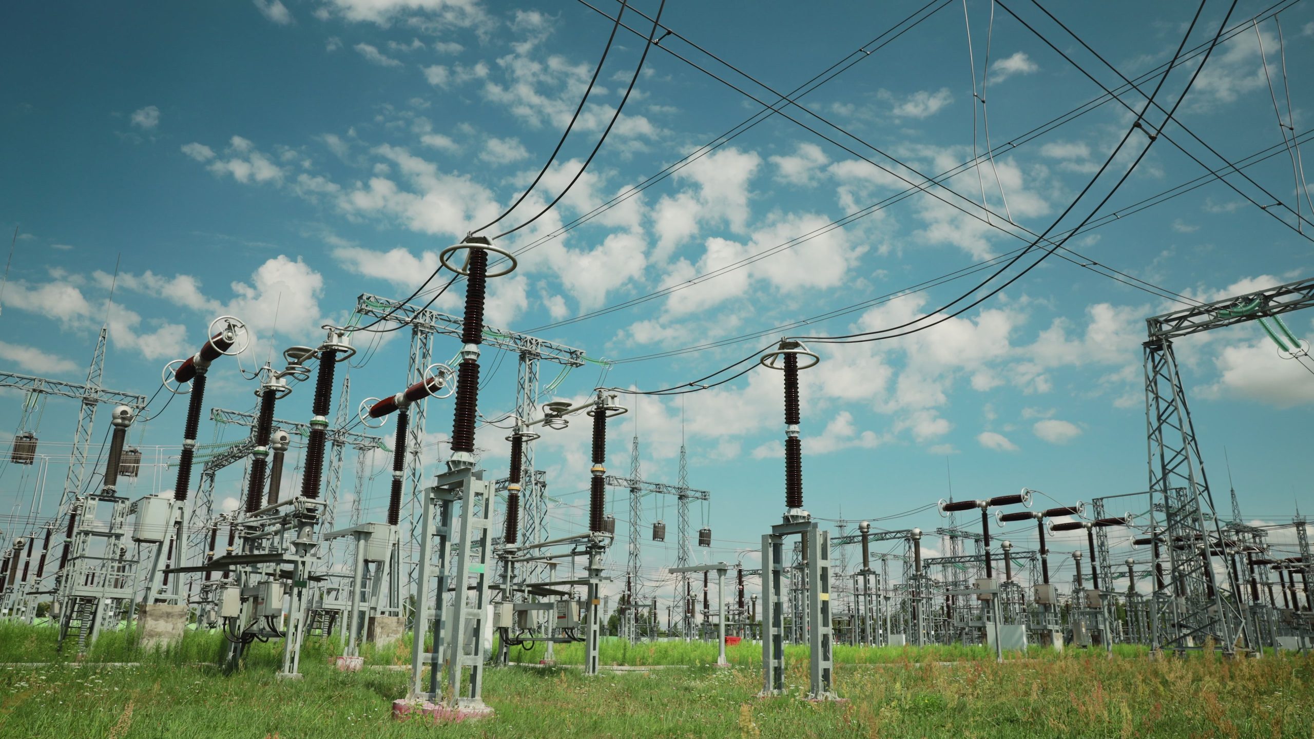 Power Grid Station. Electrical Distribution Station, Transformers, High-voltage Lines In Sunny Summer Day. , , , 4K